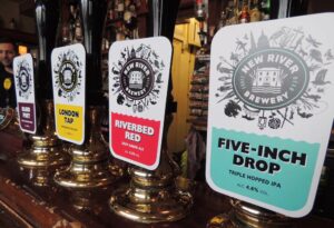 Four New River Brewery beer pumps